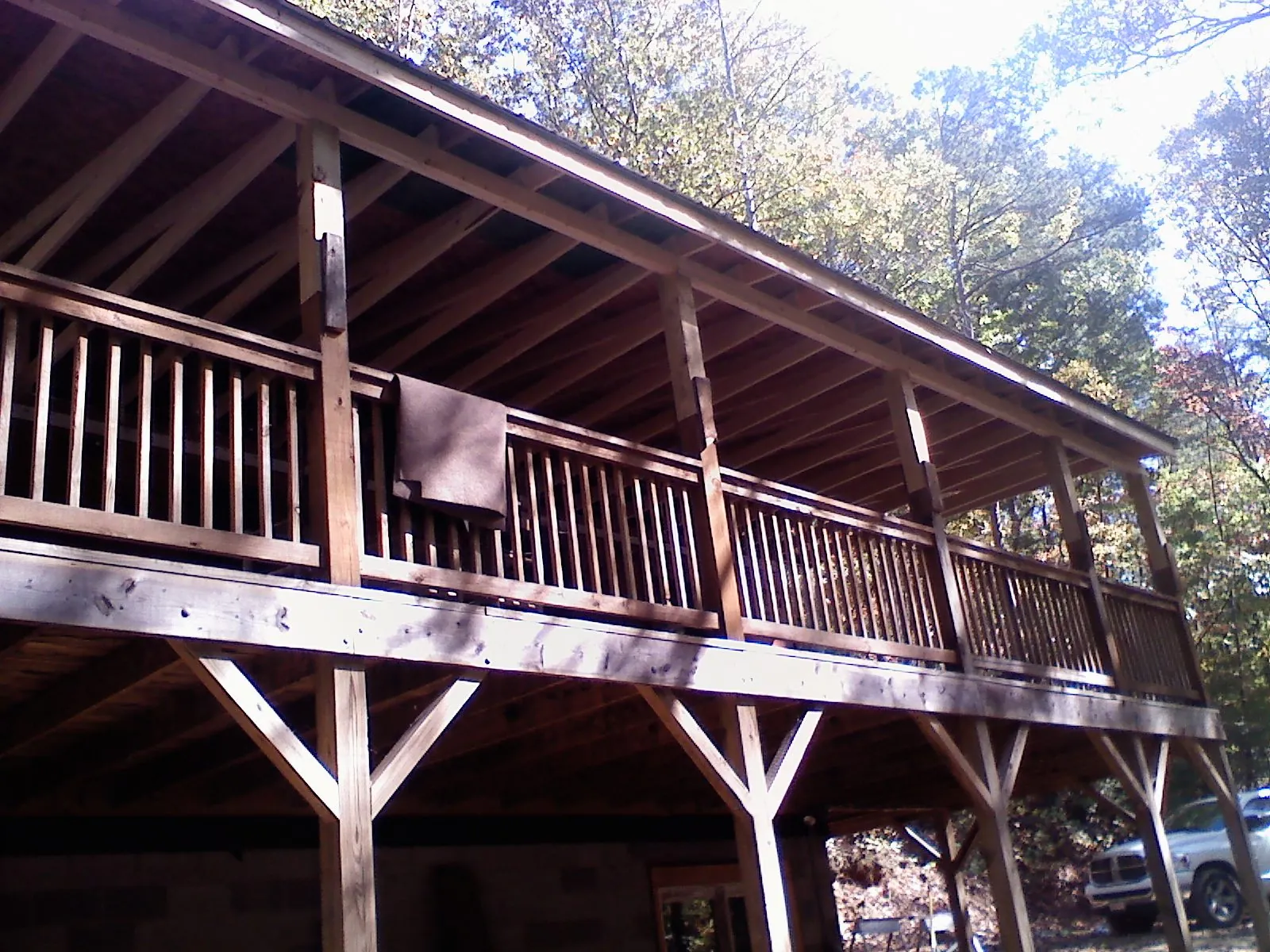 Timber framing under a new elevated porch and deck — Roof Leak Repair in North Plains by Roofing Brothers